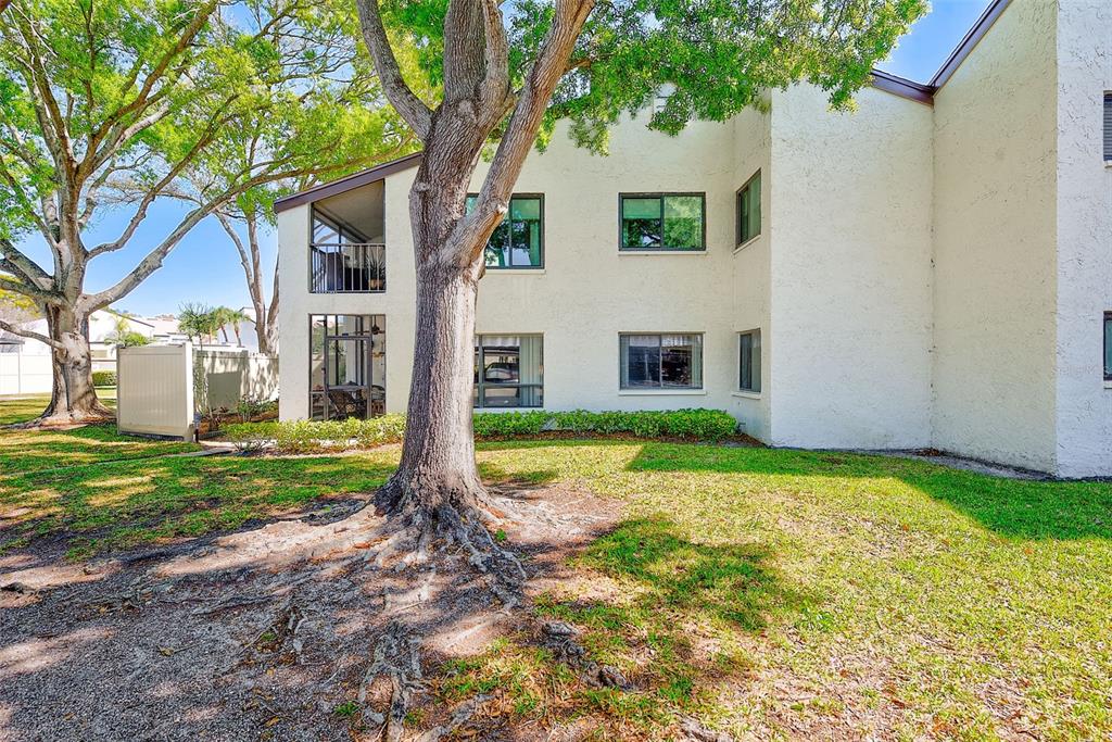 700 Starkey Road, Unit 1216 Largo, FL 33771 - Photo 29 of 32 a view of a house with yard and tree s