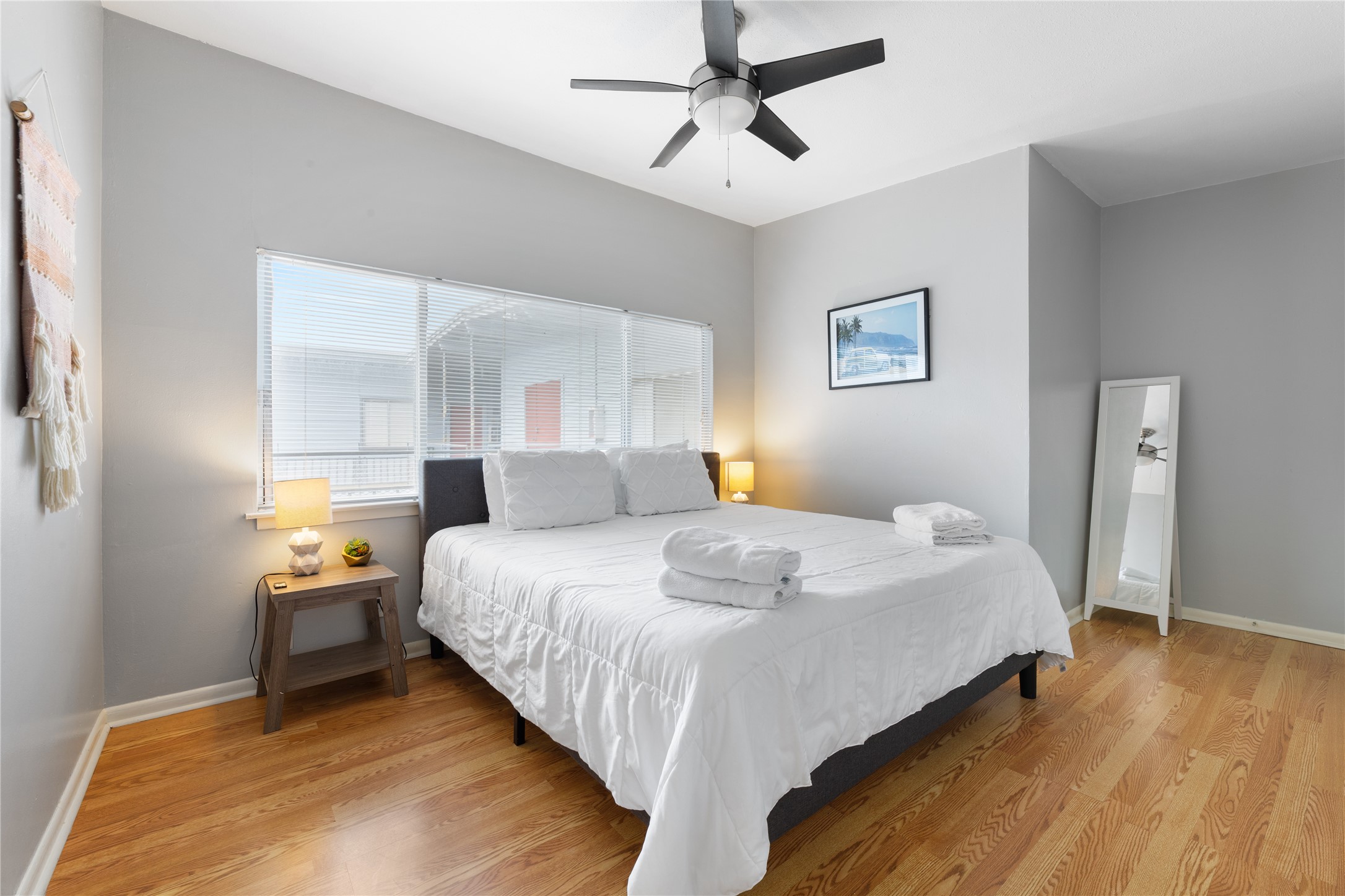 2408 Longview Street, Unit 204 Austin, TX 78705 - Photo 11 of 17 a bedroom with bed and window