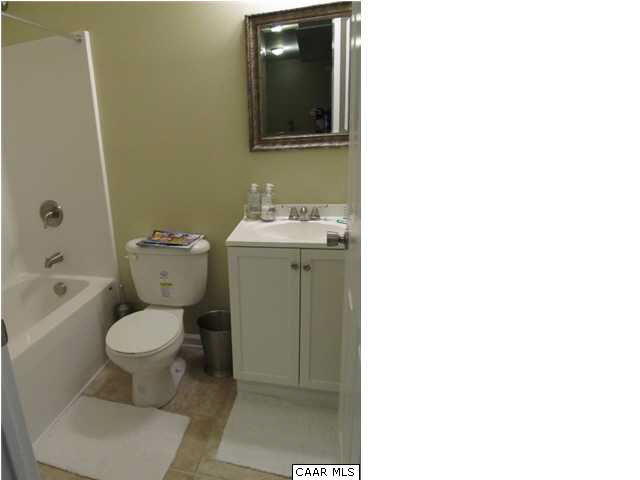 2 Bernardsburg Road Palmyra, VA 22963 - Photo 14 of 16 a bathroom with a toilet sink and mirror