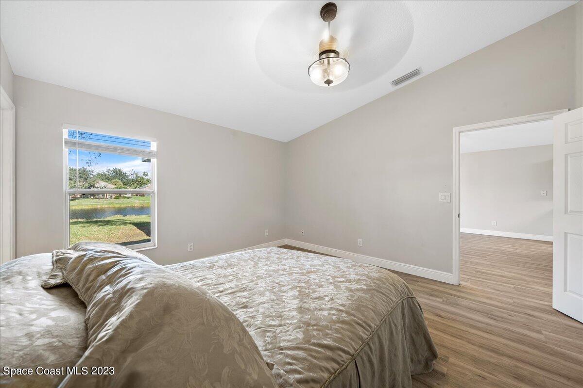 600 Benton Drive Melbourne, FL 32901 - Photo 19 of 33 a bedroom with a bed and a window