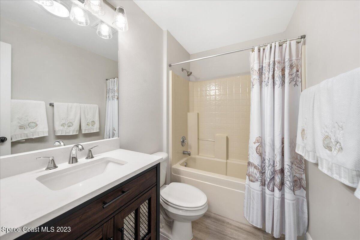 600 Benton Drive Melbourne, FL 32901 - Photo 27 of 33 a bathroom with a sink toilet and shower