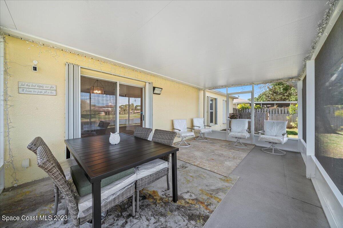 600 Benton Drive Melbourne, FL 32901 - Photo 31 of 33 a view of a dining room with furniture and wooden floor
