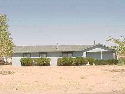 14529 Temecula Road Apple Valley, CA 92307 - Photo 1 of 1 a front view of a house with a yard