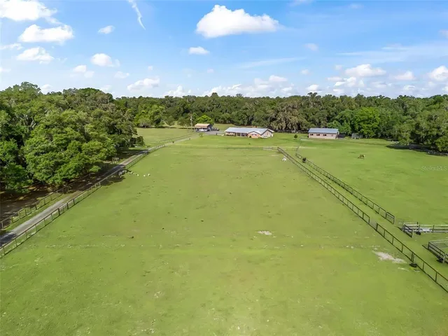 a view of a lake with a big yard