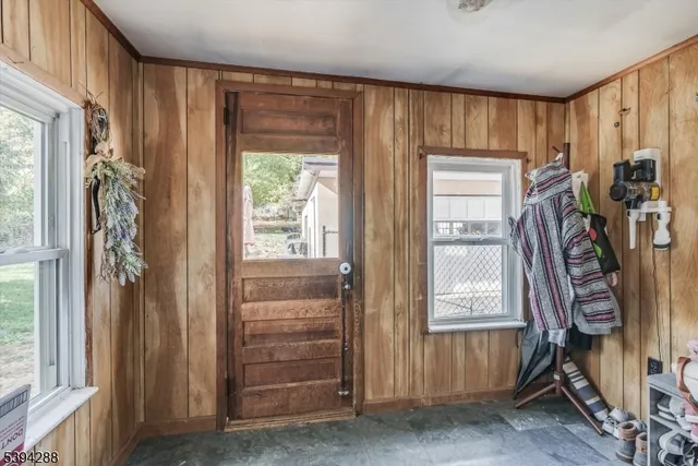 a view of an entryway with a window