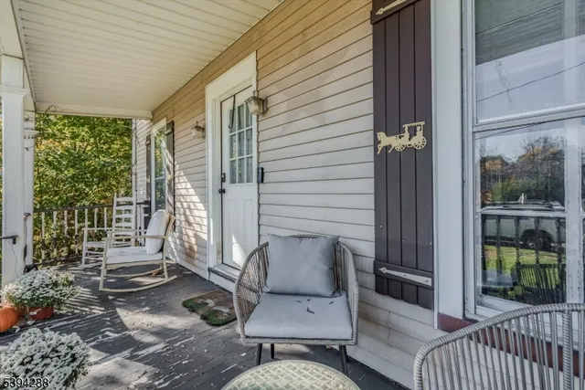 a view of a porch with furniture