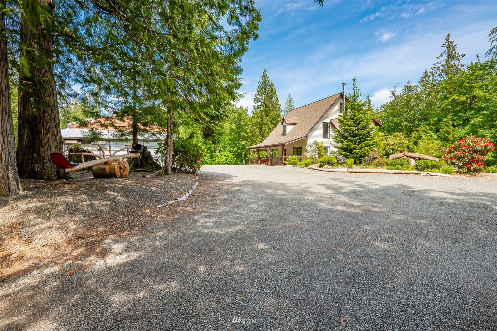 a view of a road with a building in the background