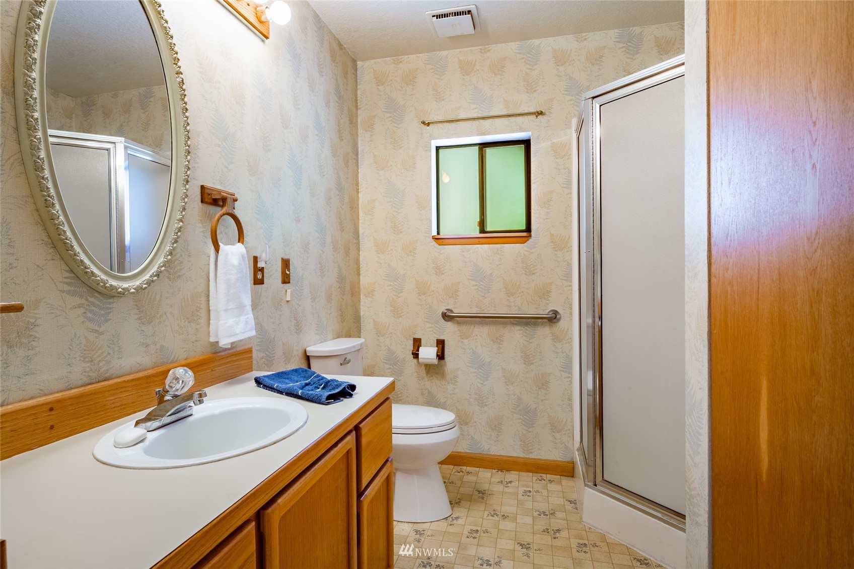 5604 Starry Road Bellingham, WA 98226 - Photo 11 of 40 a bathroom with a sink toilet and shower