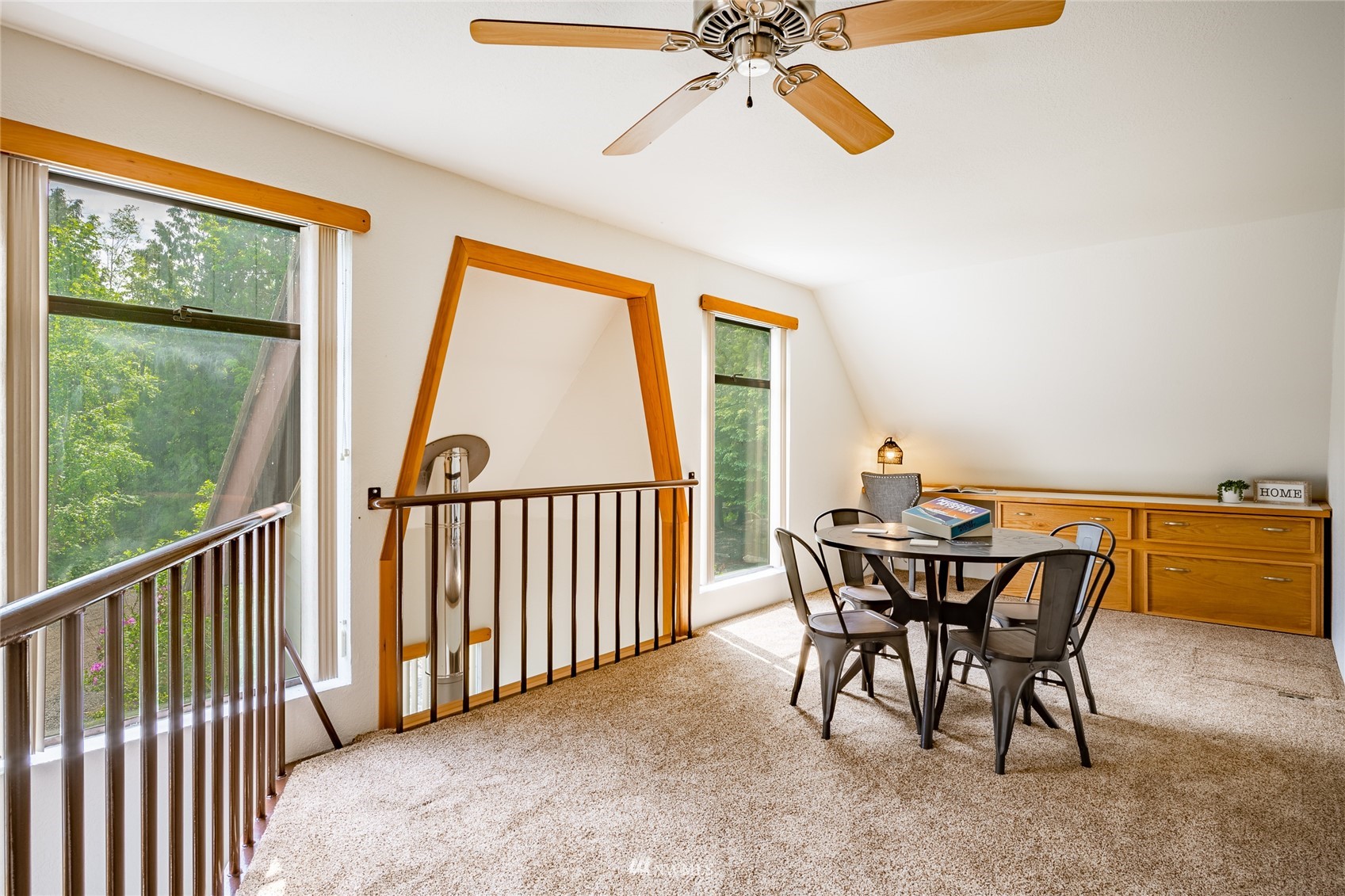 5604 Starry Road Bellingham, WA 98226 - Photo 16 of 40 a view of a dining room with furniture window and wooden floor