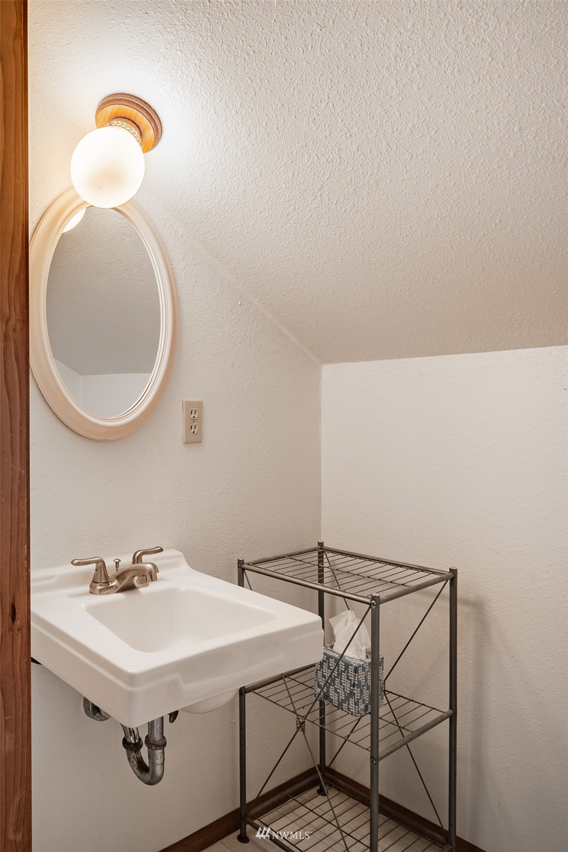 5604 Starry Road Bellingham, WA 98226 - Photo 27 of 40 a bathroom with a sink a vanity and a mirror