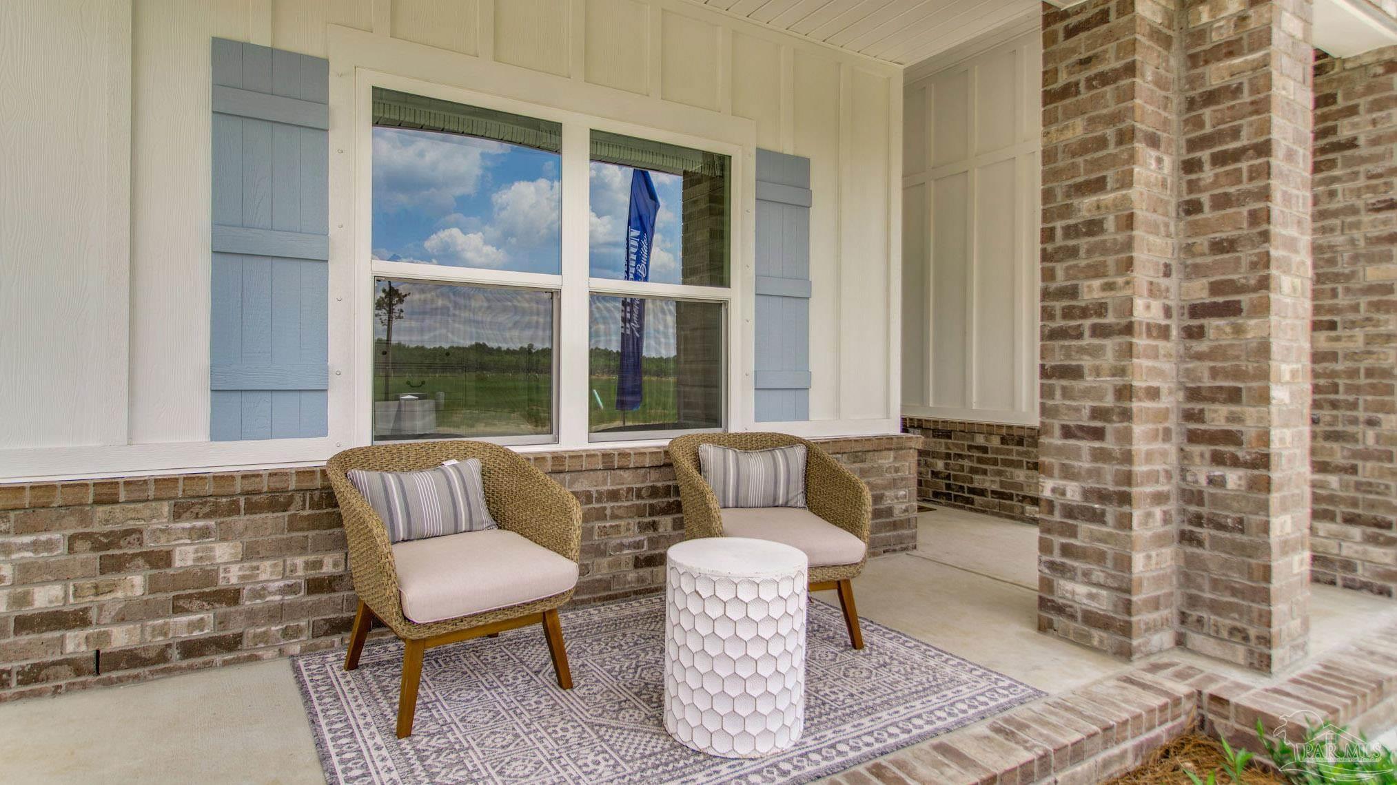 3238 Water Birch Road Cantonment, FL 32533 - Photo 2 of 38 a living room with furniture and a window