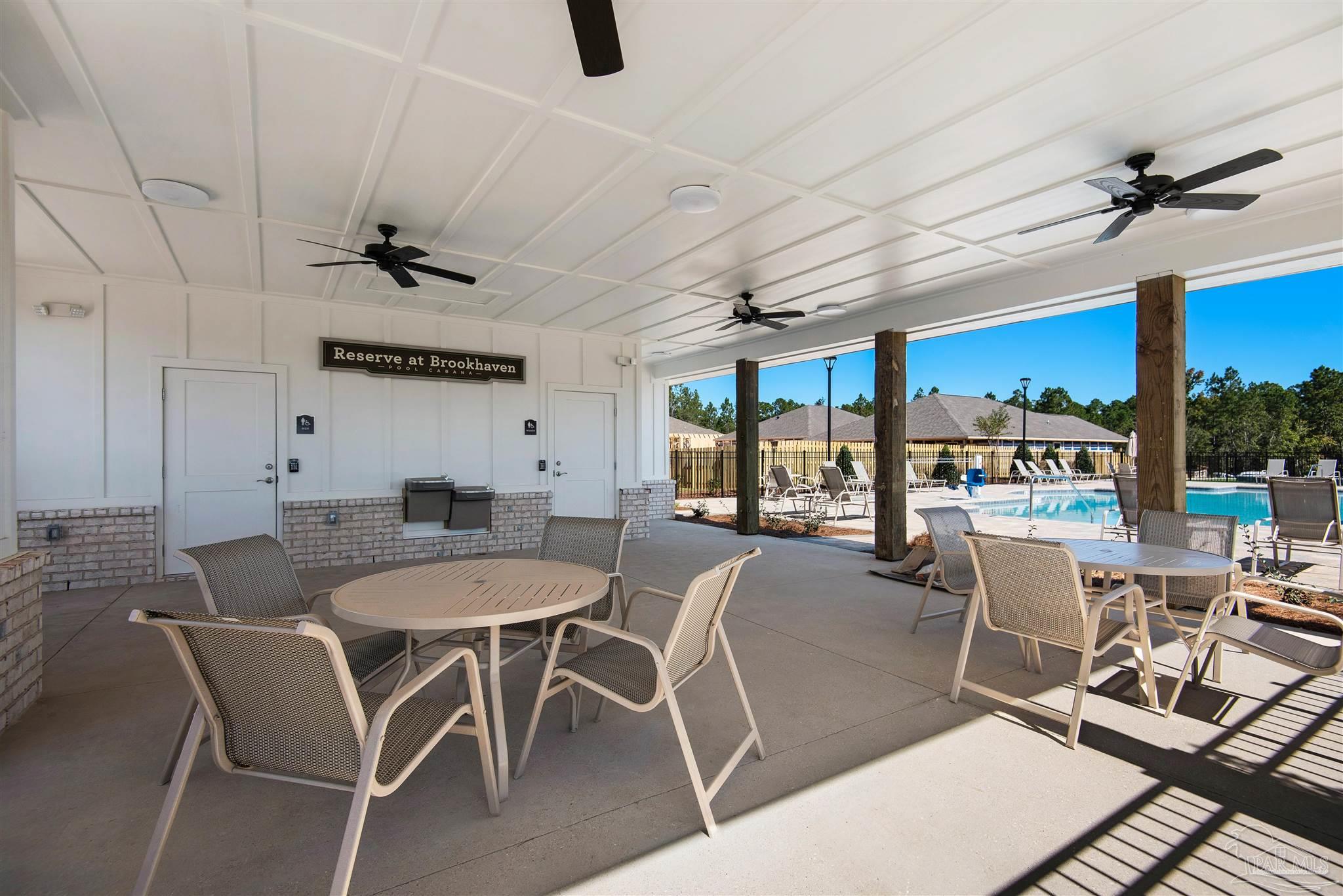 3238 Water Birch Road Cantonment, FL 32533 - Photo 35 of 38 a view of a dining room with furniture window and outside view