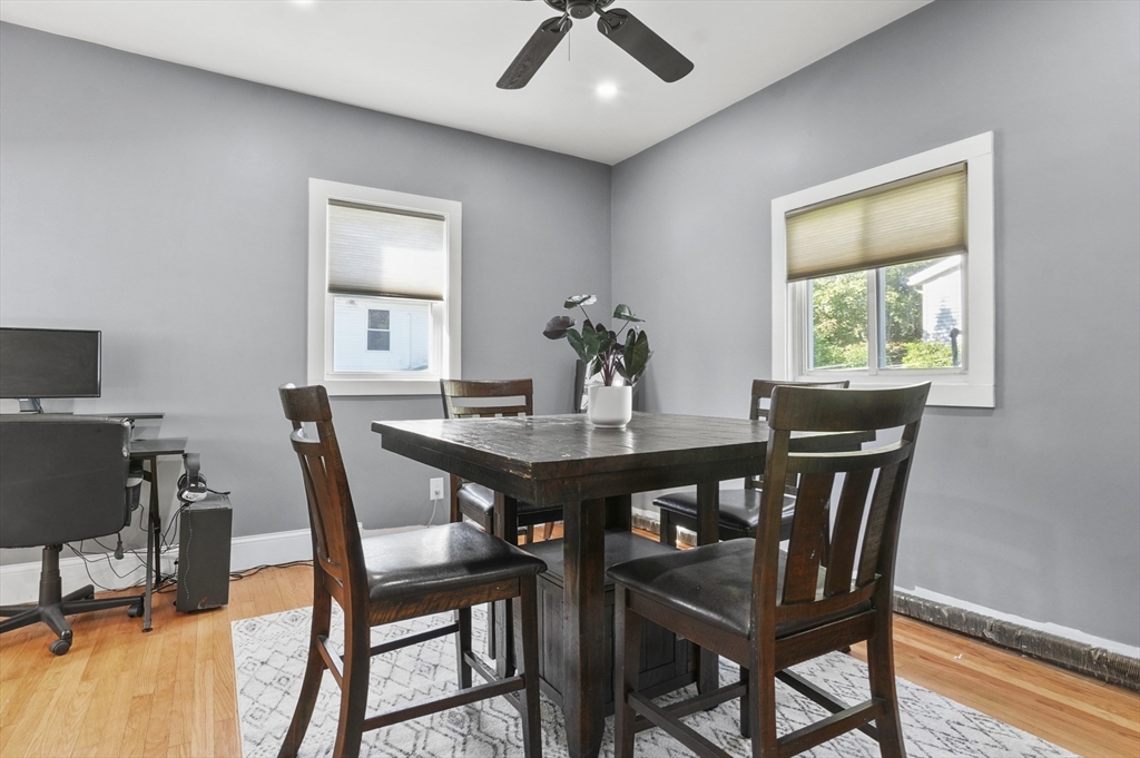 69 Eastern Avenue Woburn, MA 01801 - Photo 12 of 30 a view of a dining room with furniture window and wooden floor