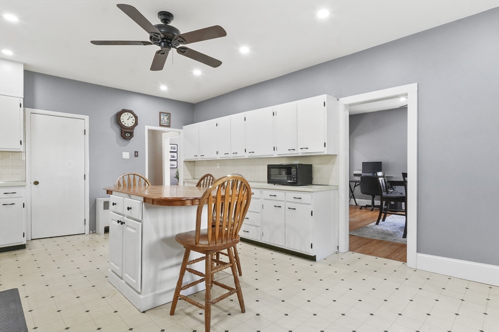 69 Eastern Avenue Woburn, MA 01801 - Photo 14 of 30 a view of kitchen with cabinets and outdoor space