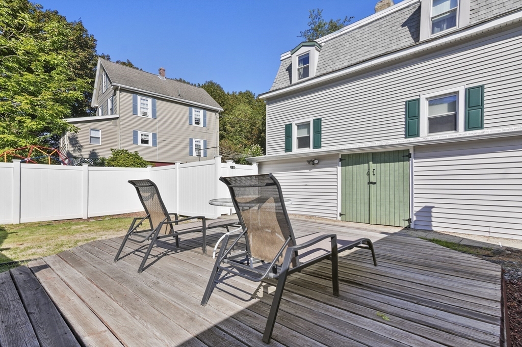 69 Eastern Avenue Woburn, MA 01801 - Photo 25 of 30 a view of a chairs with a table in balcony