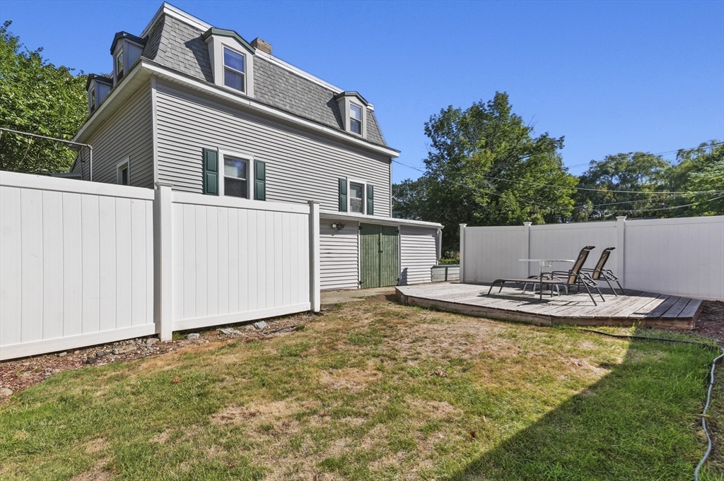 69 Eastern Avenue Woburn, MA 01801 - Photo 29 of 30 a view of a house with backyard and sitting area