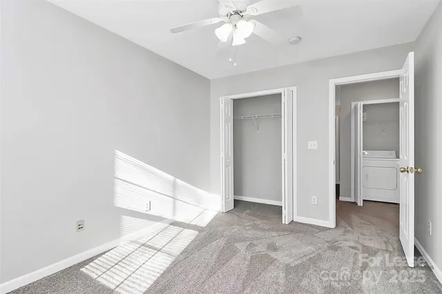 a view of a room that has a window in it