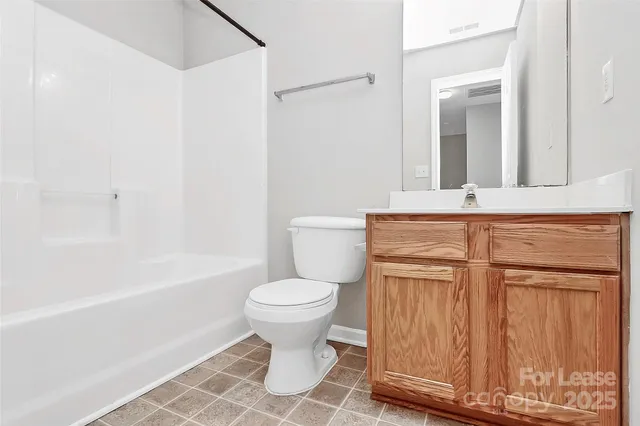 a bathroom with a white tub