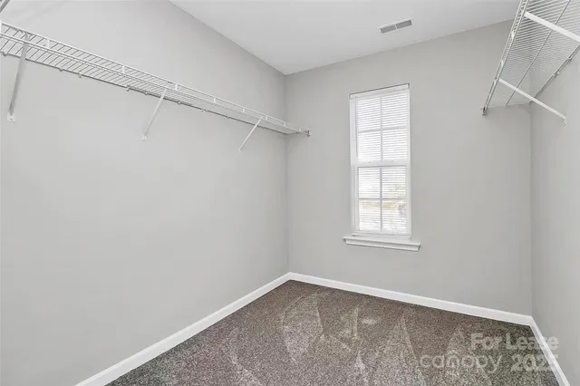 a bathroom with a shower and a bath tub
