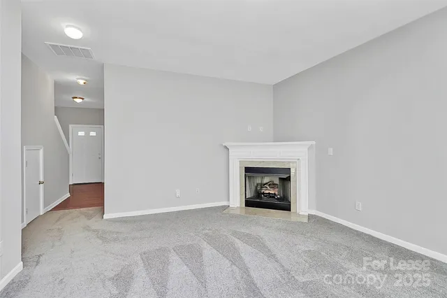 a kitchen with a stove a sink and a refrigerator