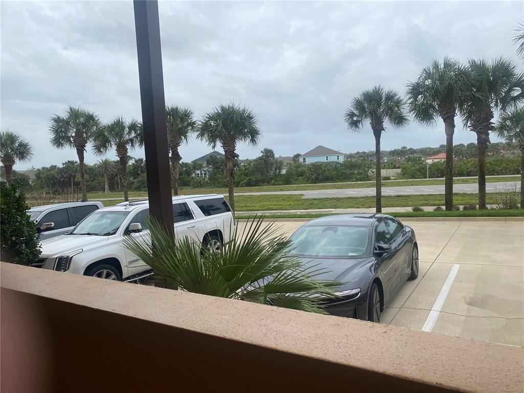 60 Surfview Drive, Unit 121 Palm Coast, FL 32137 - Photo 2 of 13 a view of a lake from a balcony