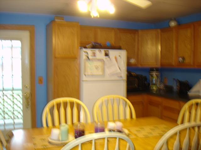 200 South Adams Ridott, IL 61067 - Photo 3 of 9 a view of swimming pool with a dining table and chairs