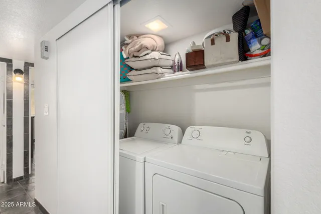 a utility room with dryer and washer