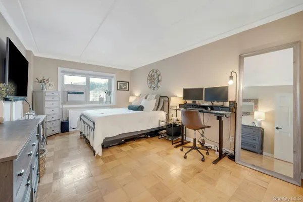 a bedroom with a bed and furniture