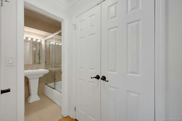 a bathroom with a shower and toilet