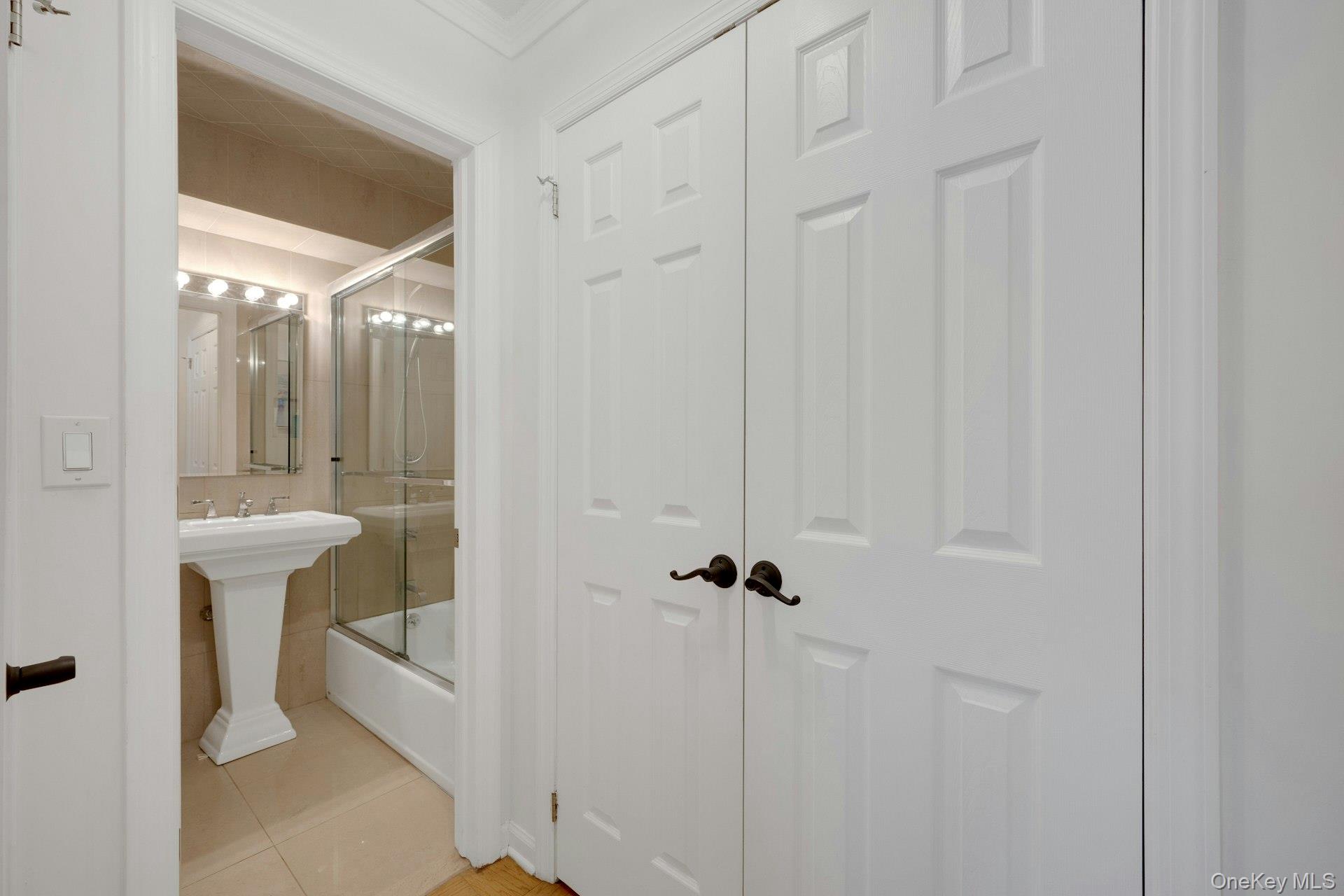 480 Halstead Avenue, Unit 2J Harrison, NY 10528 - Photo 13 of 16 a bathroom with a shower and toilet