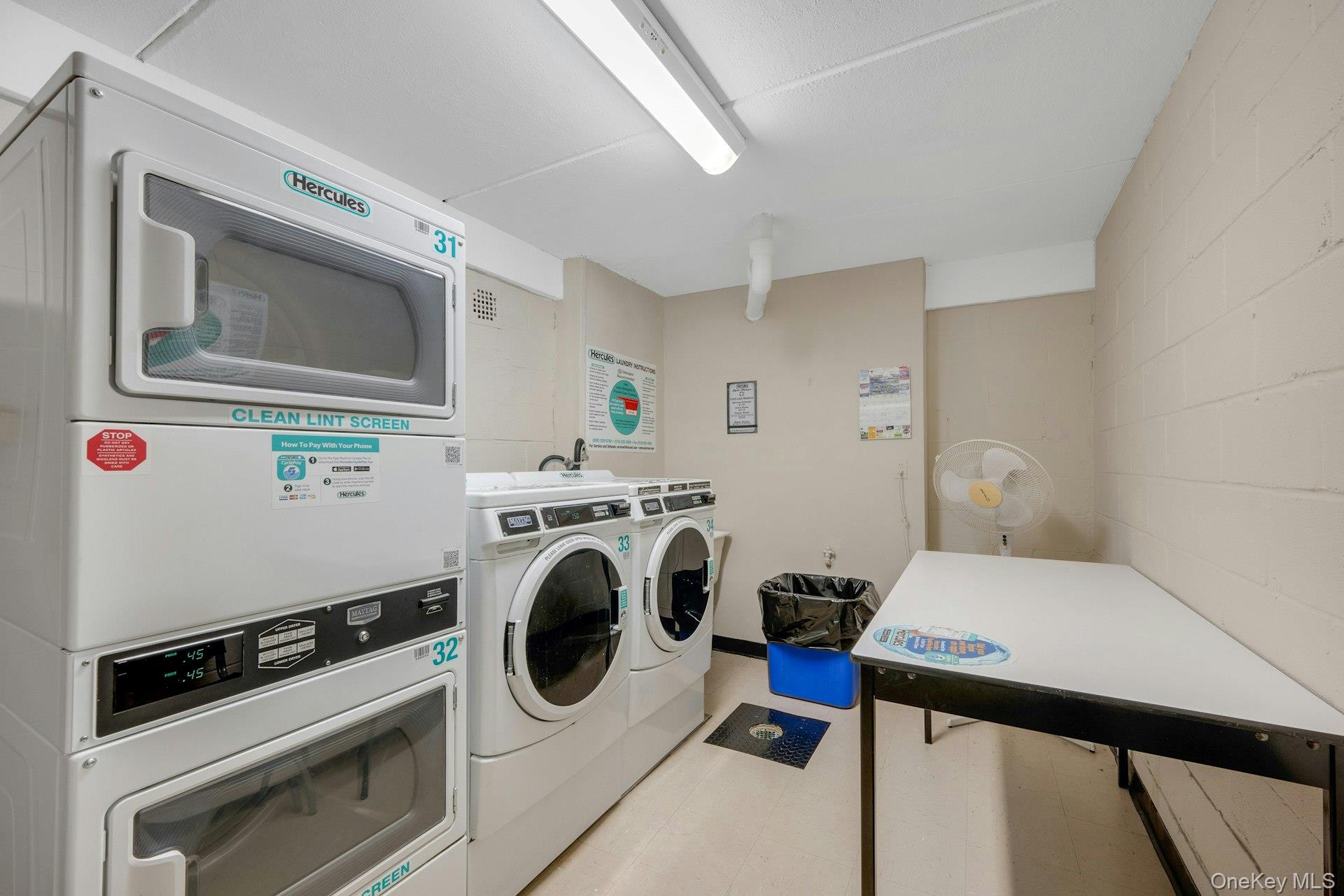480 Halstead Avenue, Unit 2J Harrison, NY 10528 - Photo 15 of 16 a utility room with dryer and washer