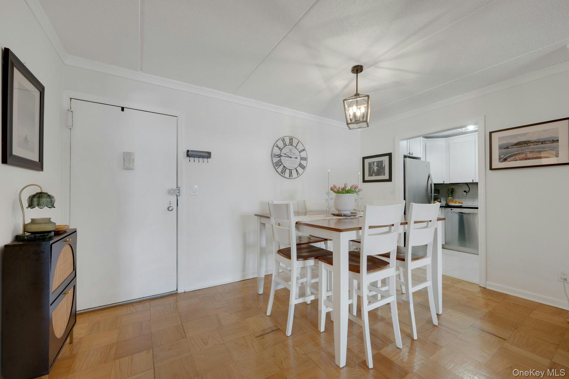 480 Halstead Avenue, Unit 2J Harrison, NY 10528 - Photo 8 of 16 a view of a dining room with furniture