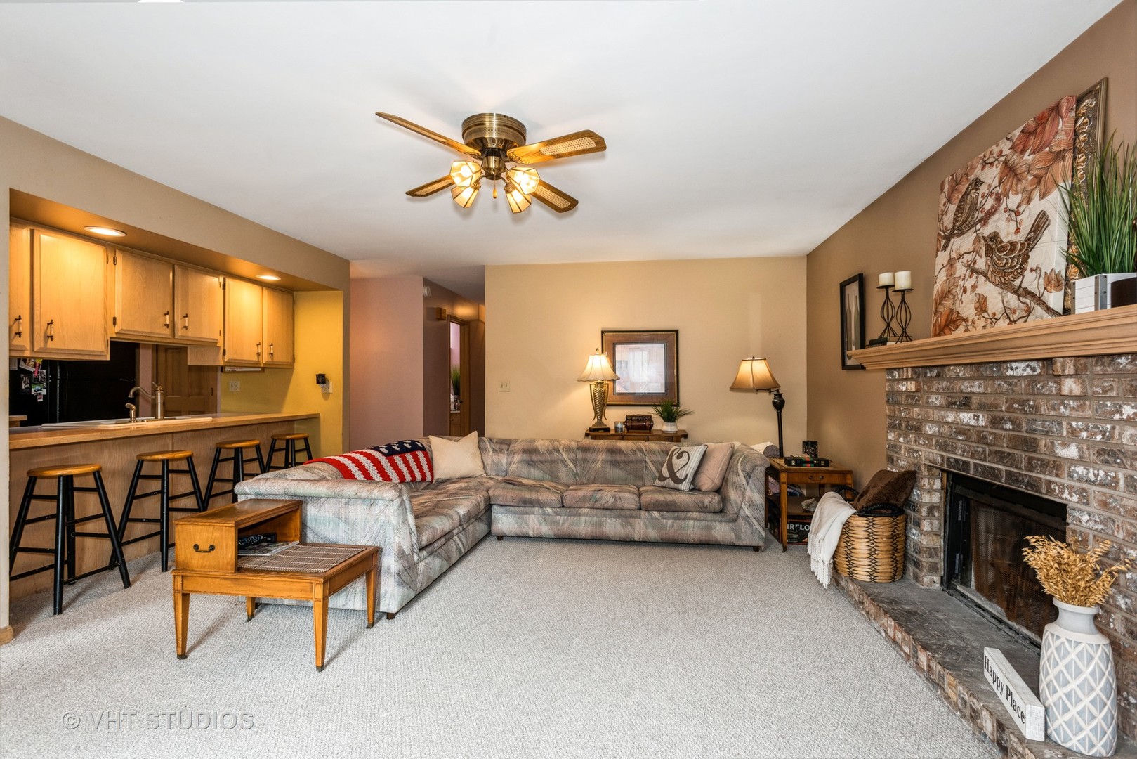 577 Yellowstone Drive Elgin, IL 60123 - Photo 12 of 30 a living room with furniture and a fireplace