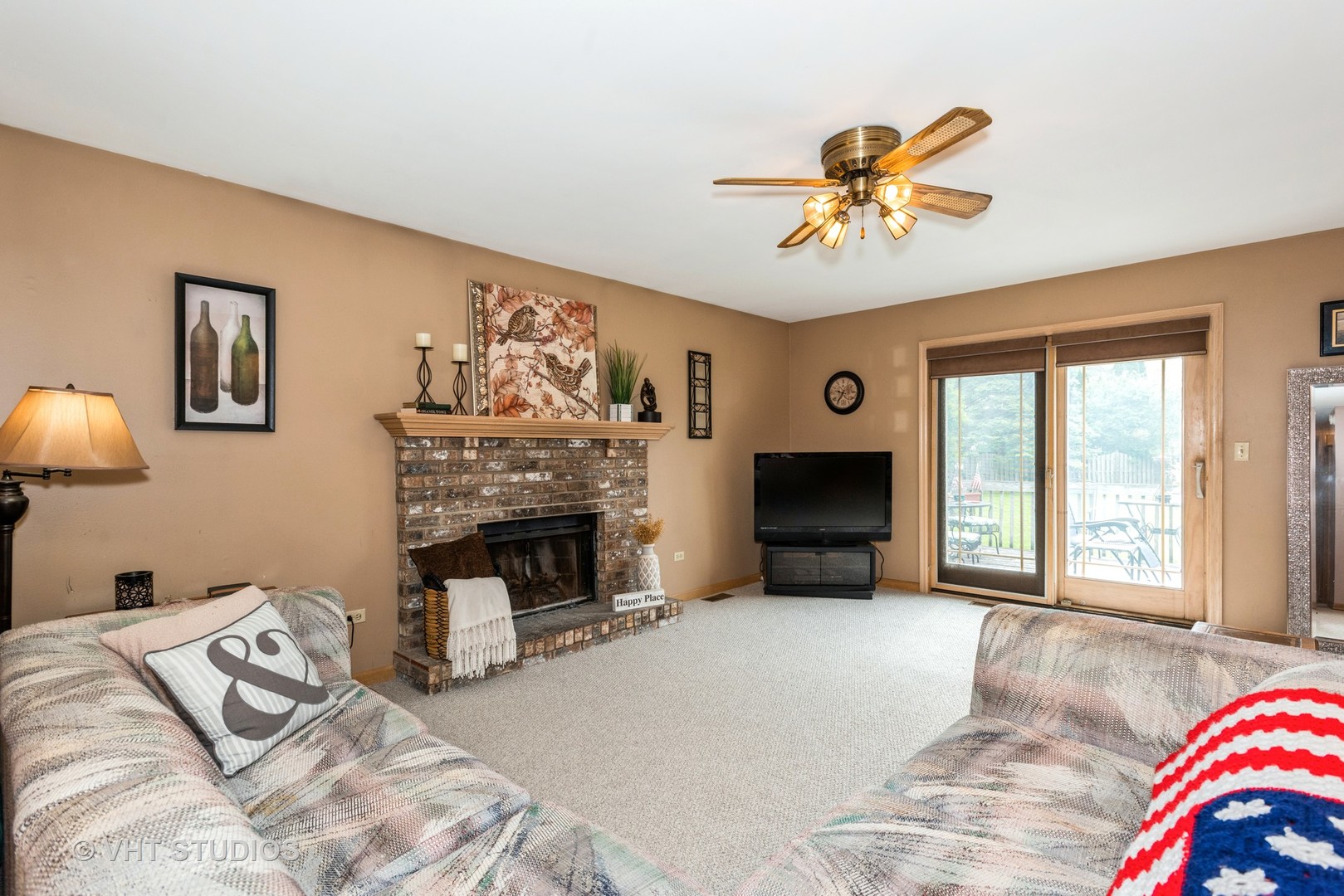 577 Yellowstone Drive Elgin, IL 60123 - Photo 13 of 30 a bedroom with a bed and a fireplace