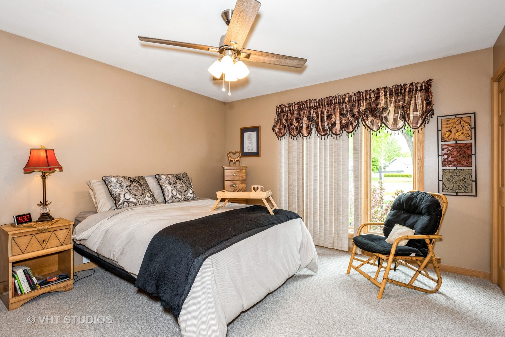 577 Yellowstone Drive Elgin, IL 60123 - Photo 14 of 30 a bedroom with a bed a chair and a chandelier
