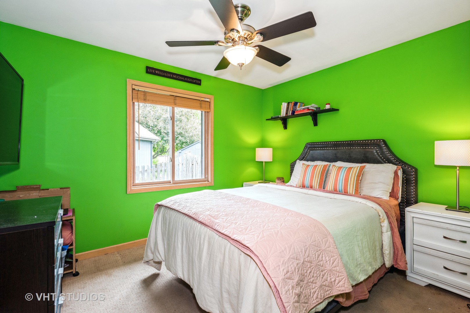 577 Yellowstone Drive Elgin, IL 60123 - Photo 17 of 30 a bedroom with a bed and a chandelier