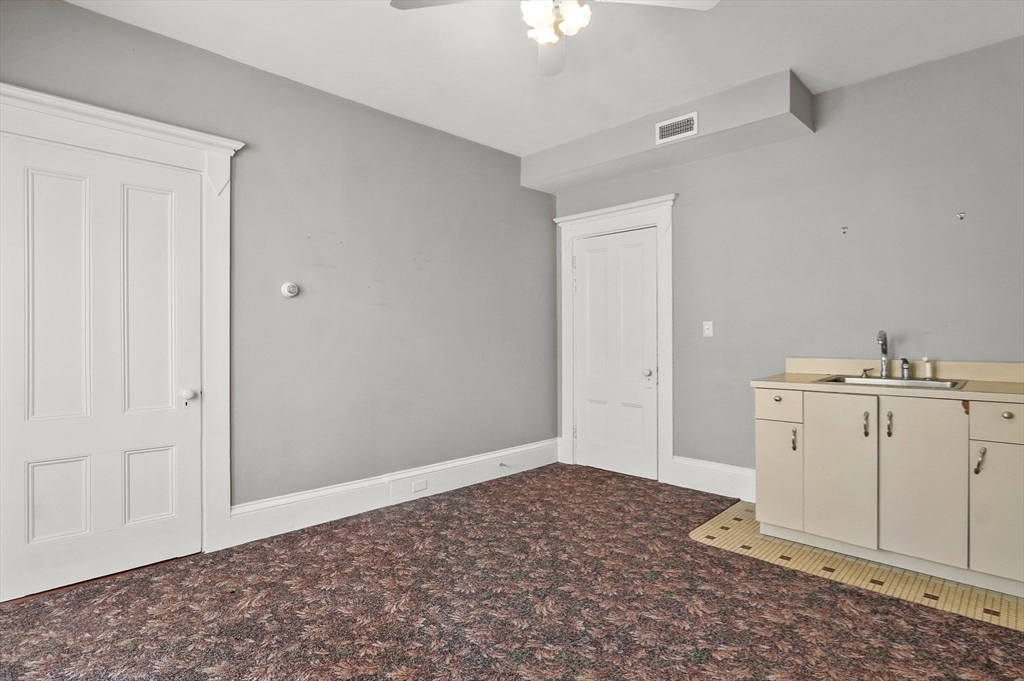 55-57 Crescent Street Waltham, MA 02453 - Photo 26 of 37 a view of a utility room with closet