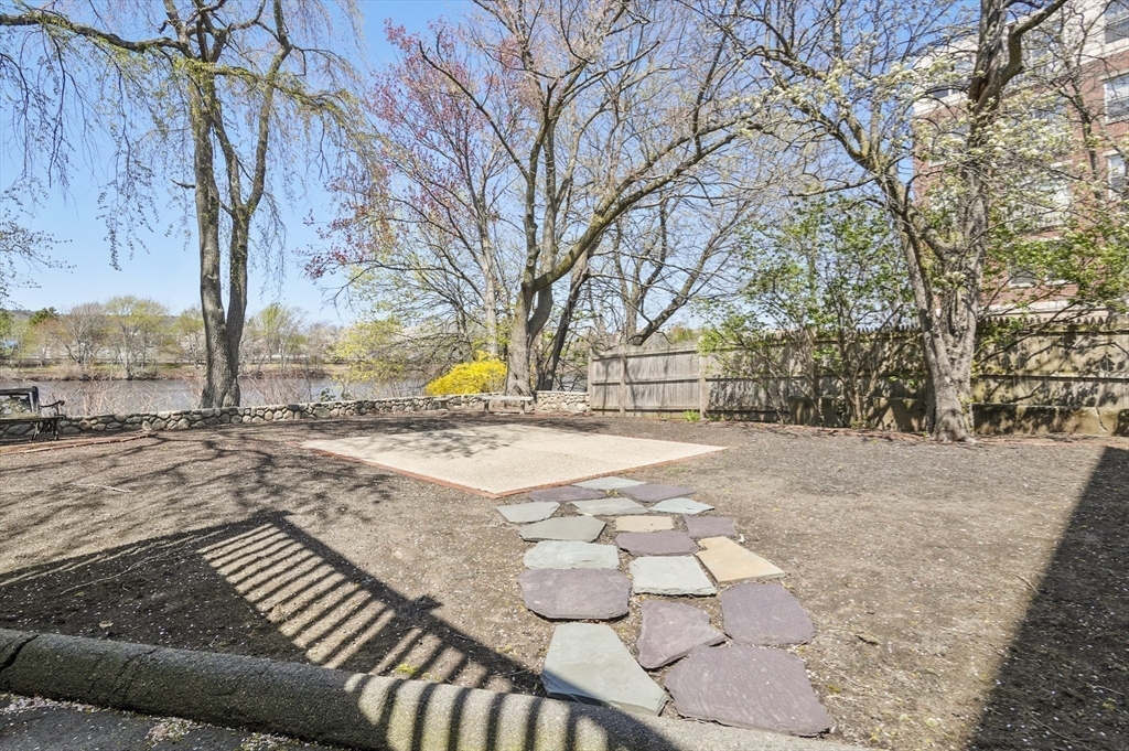 55-57 Crescent Street Waltham, MA 02453 - Photo 30 of 37 a view of outdoor space with lounge chair