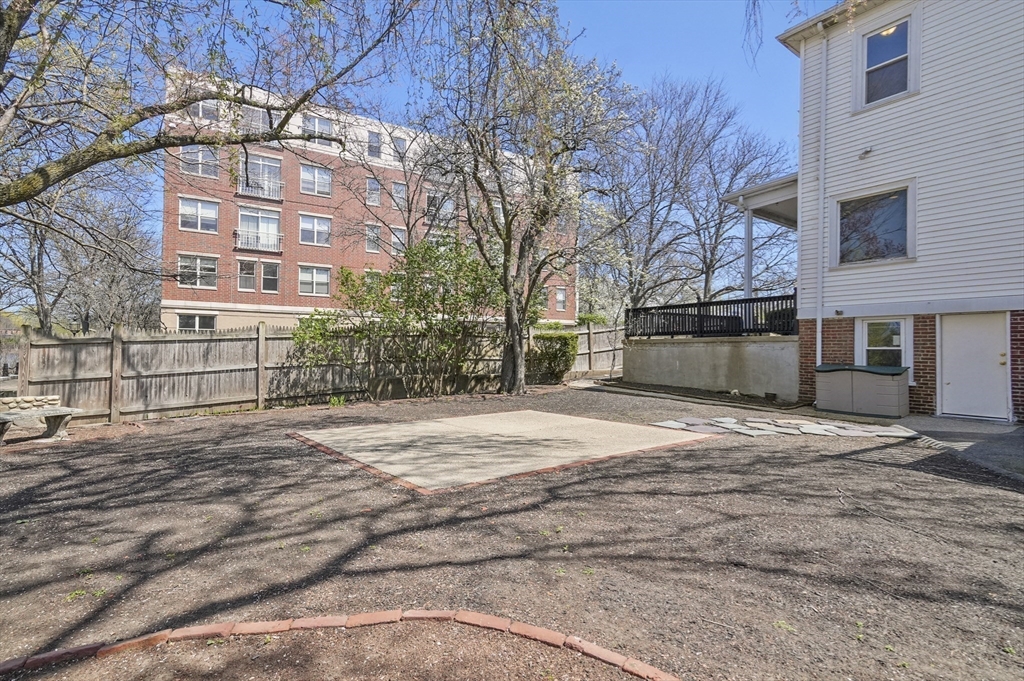 55-57 Crescent Street Waltham, MA 02453 - Photo 31 of 37 a view of a building with a outdoor space