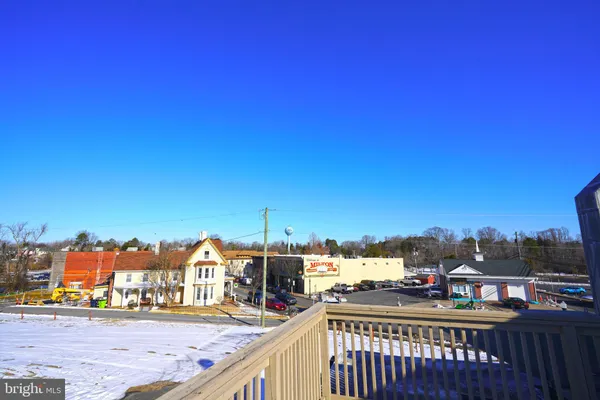 a view of a balcony with city view