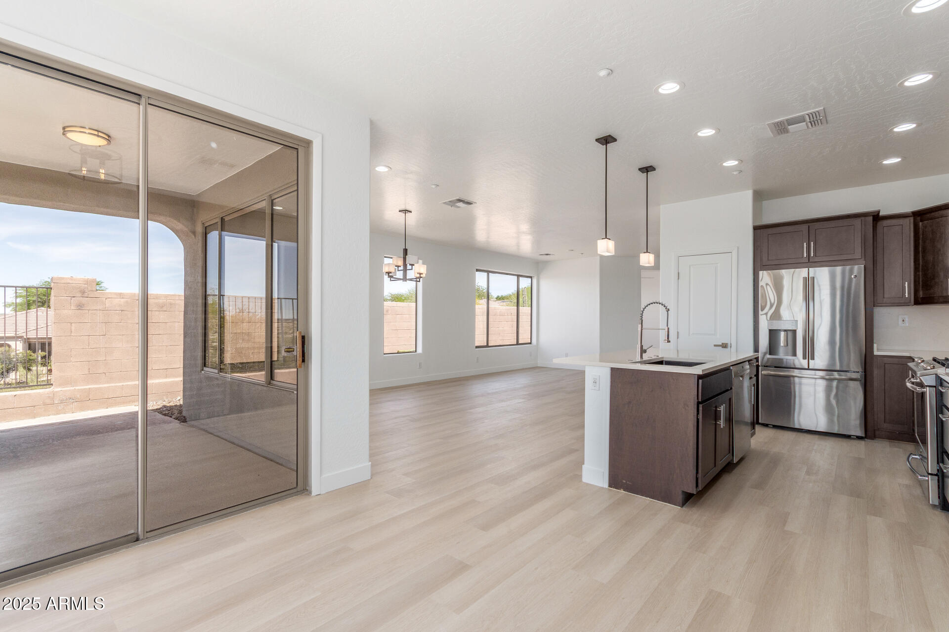 41401 North Maidstone Court Anthem, AZ 85086 - Photo 13 of 53 a view of kitchen with refrigerator and window