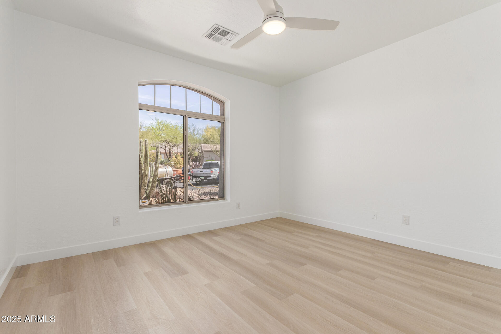 41401 North Maidstone Court Anthem, AZ 85086 - Photo 25 of 53 an empty room with large window