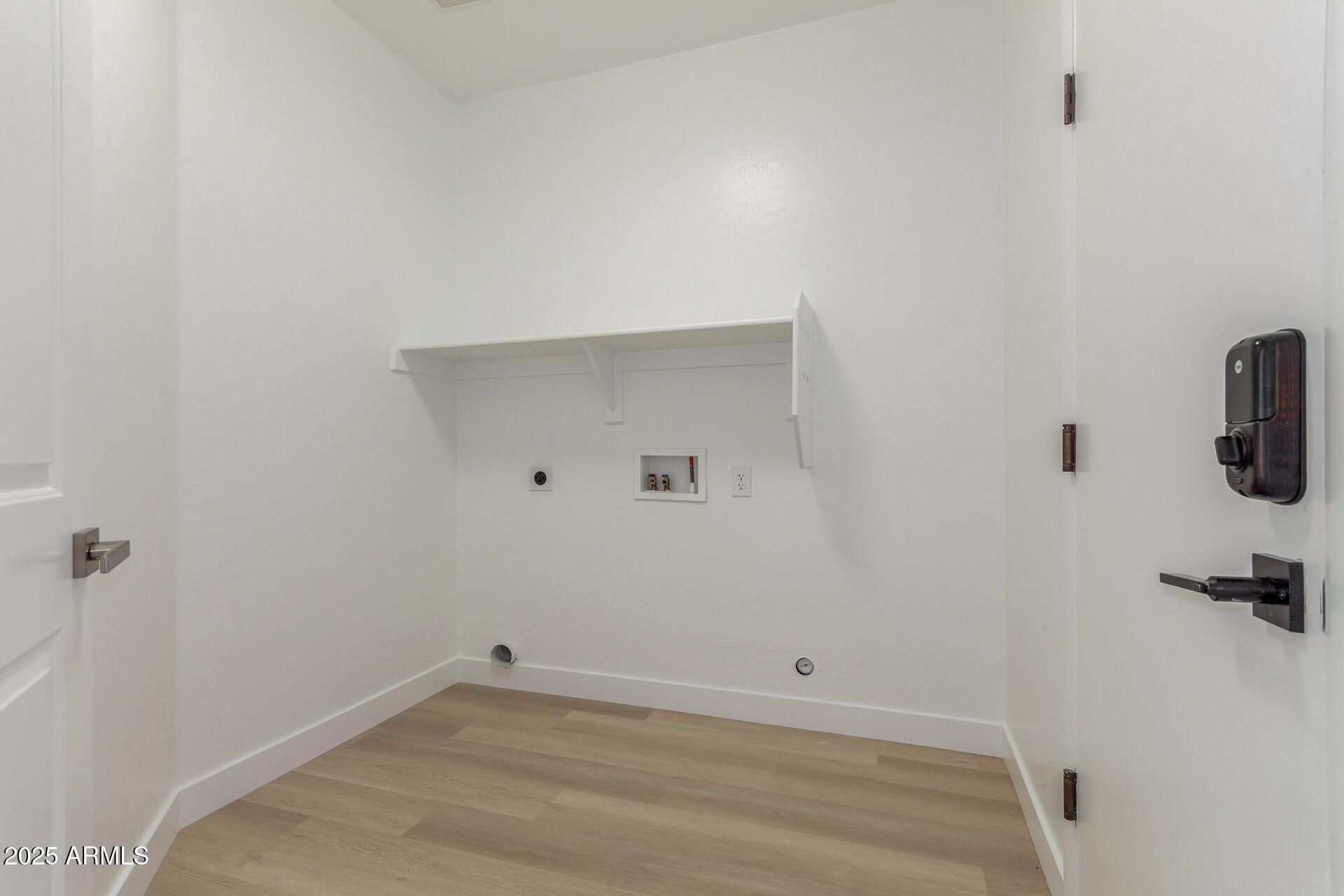 41401 North Maidstone Court Anthem, AZ 85086 - Photo 26 of 53 a view of a room with rack on the wall