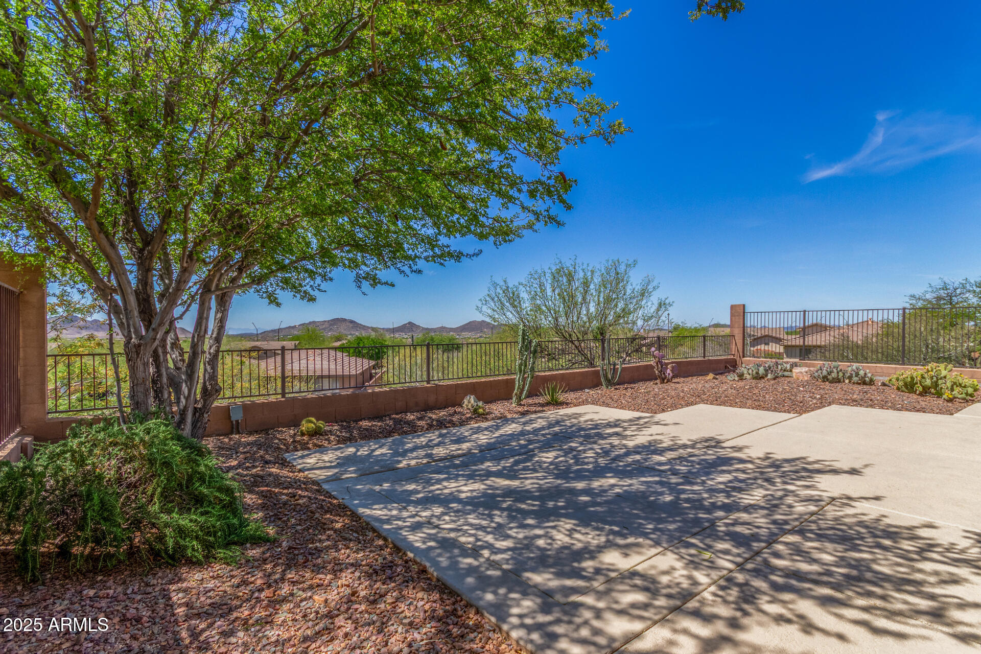 41401 North Maidstone Court Anthem, AZ 85086 - Photo 33 of 53 a view of a backyard of a house