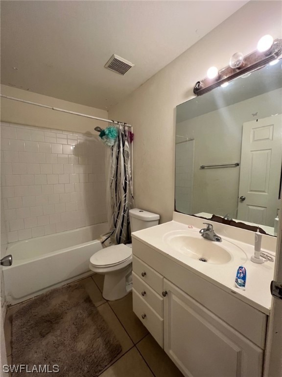 5311 Banning Street Lehigh Acres, FL 33971 - Photo 13 of 21 a bathroom with a sink a toilet and shower