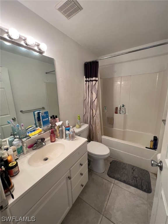 5311 Banning Street Lehigh Acres, FL 33971 - Photo 21 of 21 a bathroom with a double vanity sink a toilet and shower