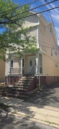 a view of a house with a patio