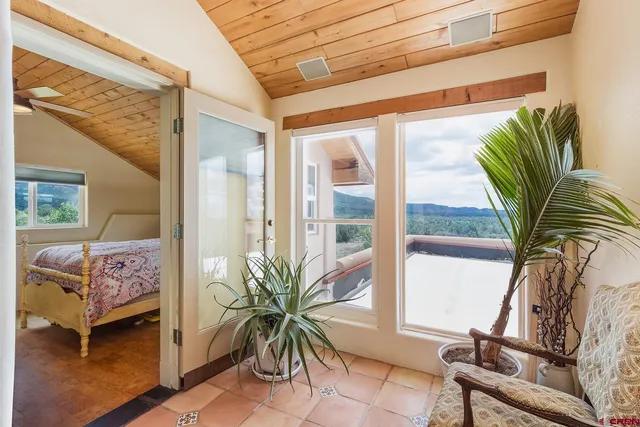 a view of backyard with cabin