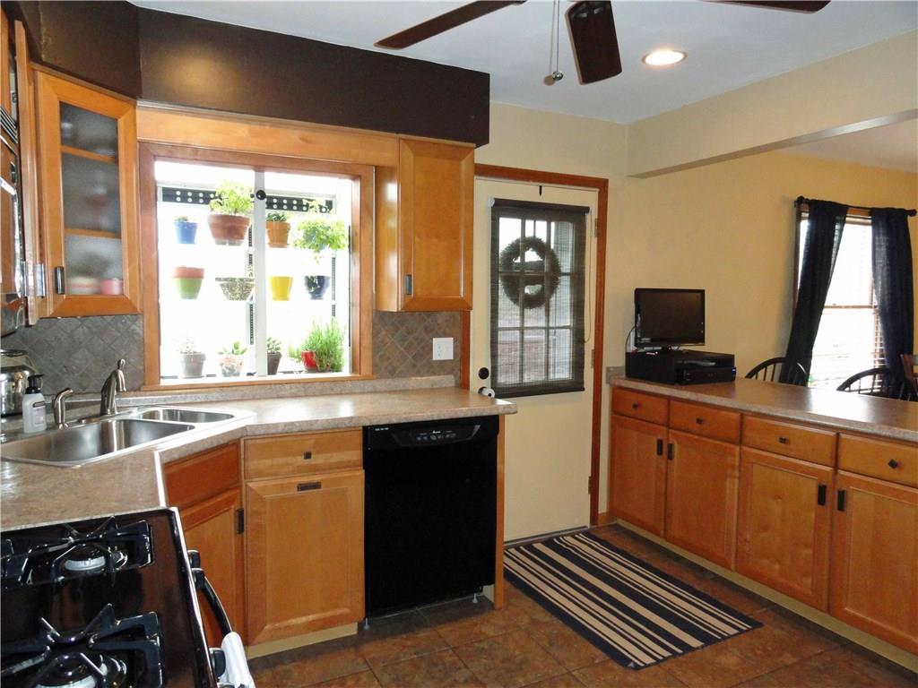 541 First Street North Huntingdon, PA 15642 - Photo 8 of 24 Kitchen opens to back deck
