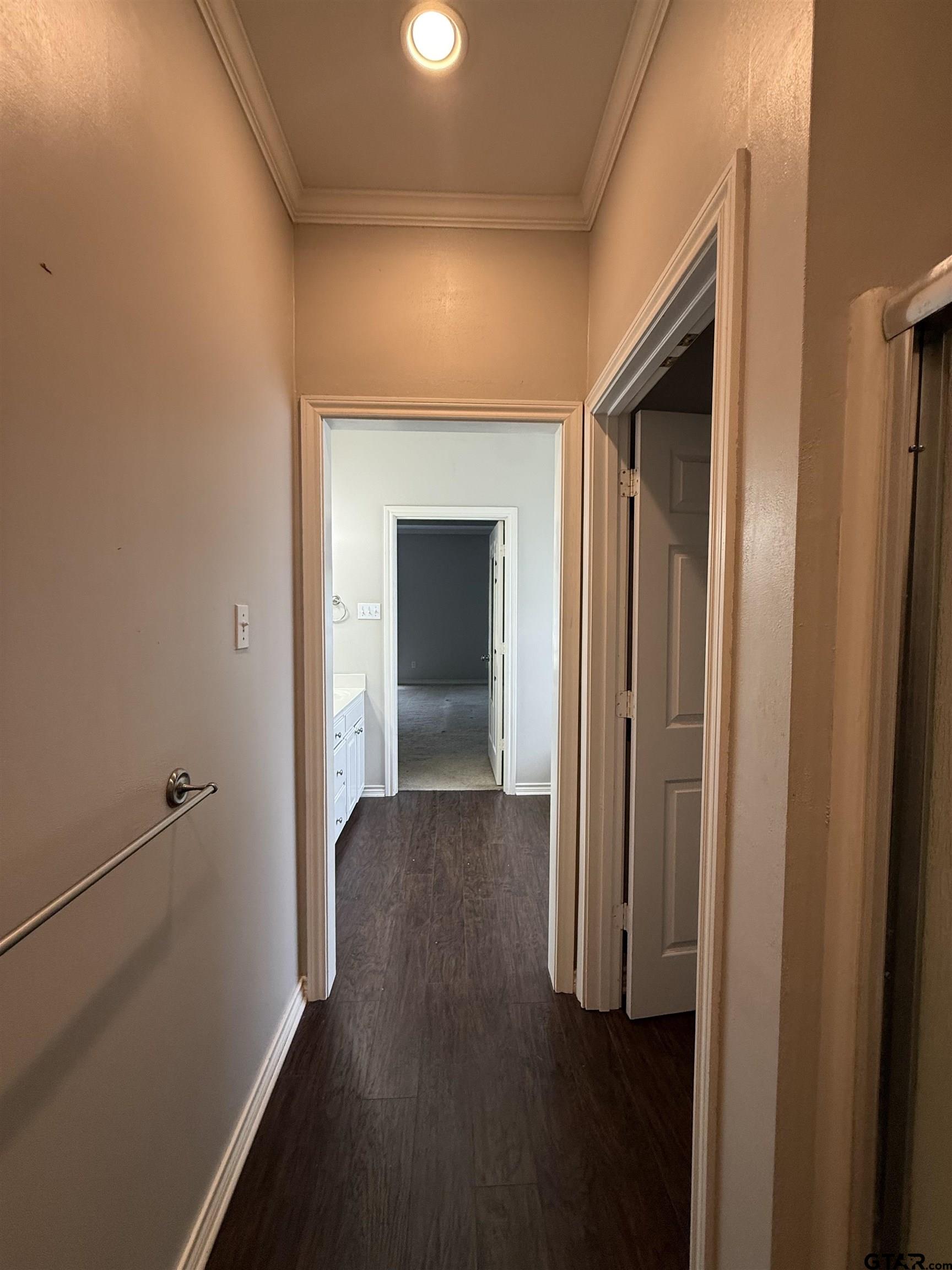 3204 Pebblebrook Circle Tyler, TX 75707 - Photo 14 of 18 a view of a hallway with wooden floor